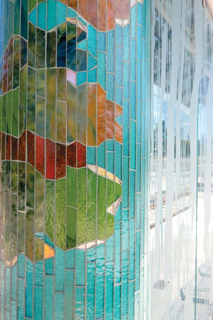 'Journey Through Time' bus shelter column tile mosaic in an oak leaves pattern