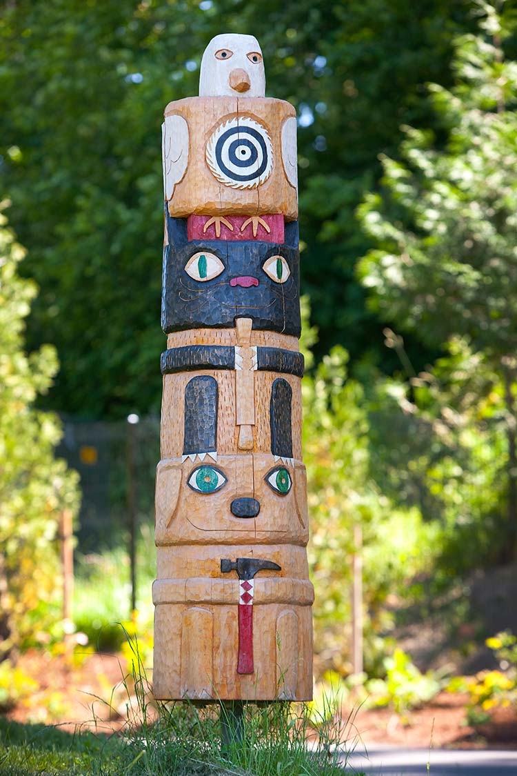 'Phylogeny' - totem pole with carved wooden animals