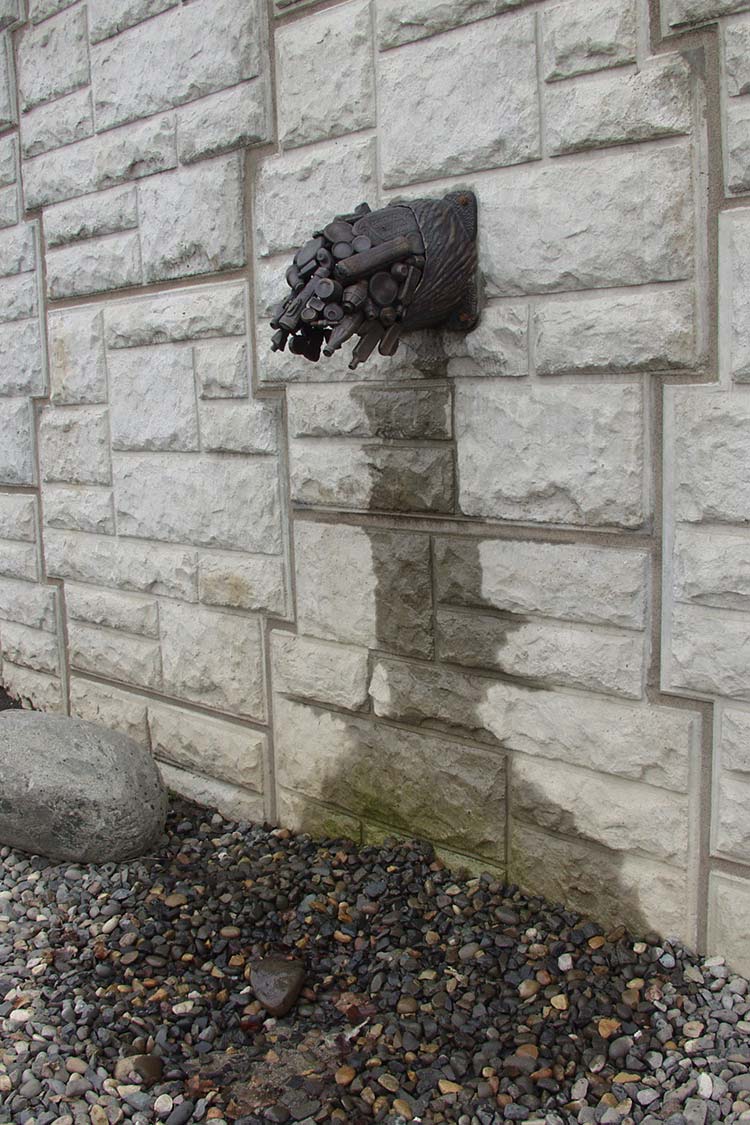Scupper - artistic drainage spout cast in metal