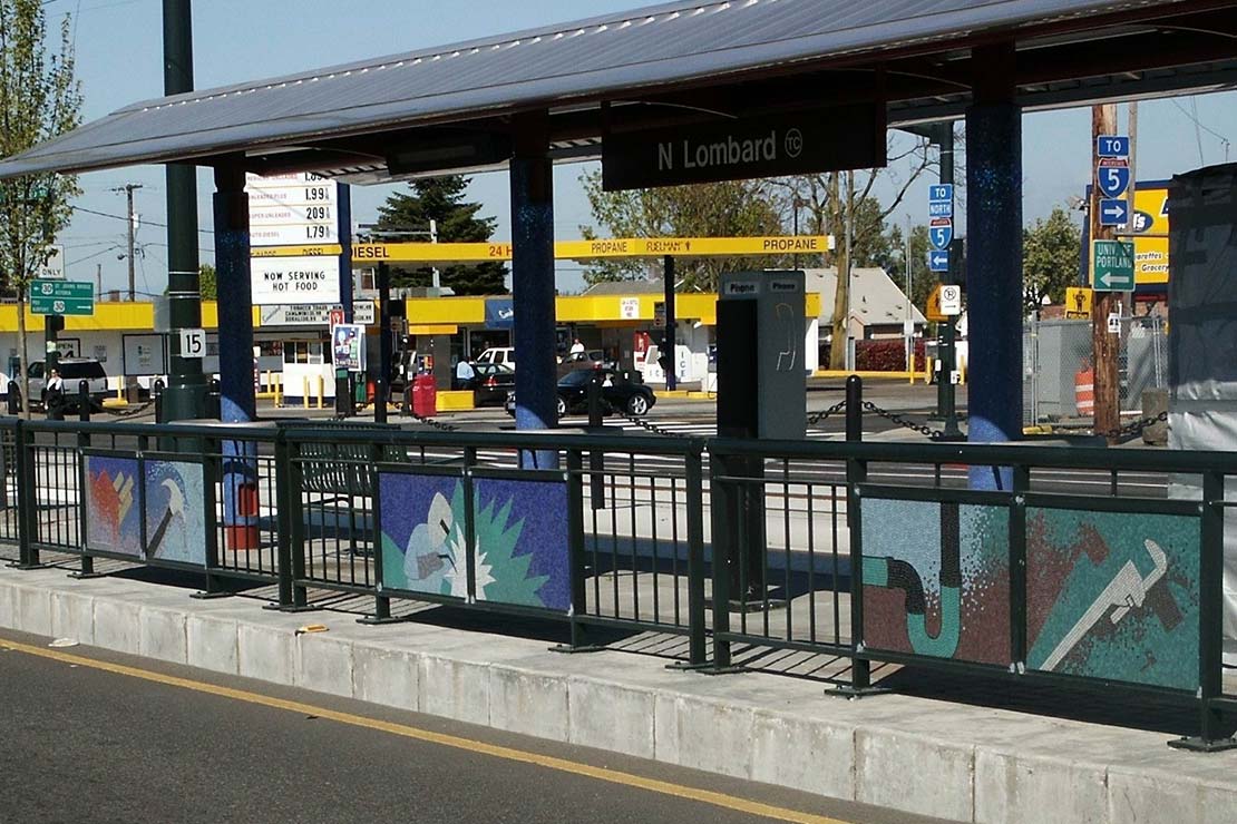 Decorative guardrail panels between the MAX platform and the street