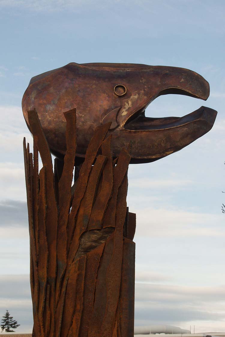 Salmon - gigantic salmon head on a tall metal base